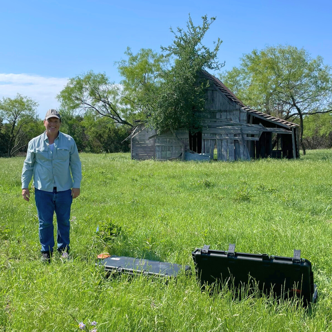 Andrew from Well Water Finders locating groundwater on old ranch.